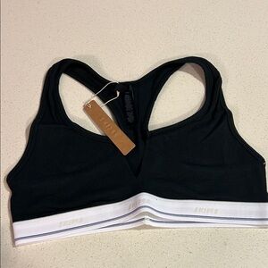 SKIMS Black and White Sports Bra